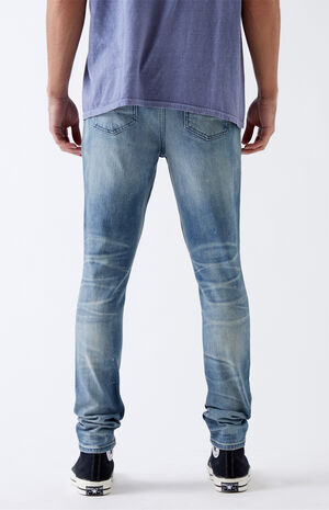 Medium Paint Splatter Stacked Skinny Jeans | PacSun | PacSun