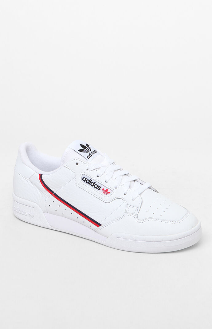 white adidas with red