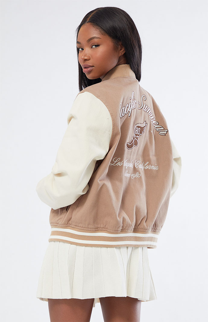 brown varsity jacket outfit girl